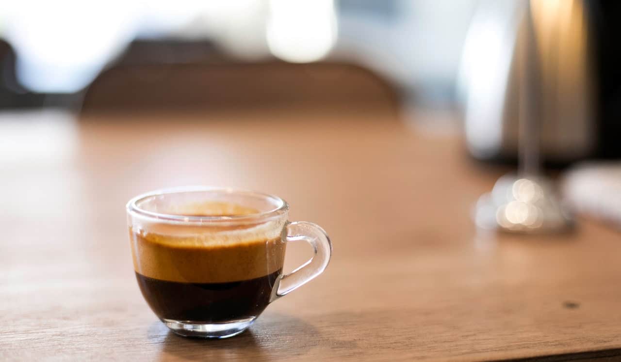 espresso shot on a table - espresso vs cappuccino