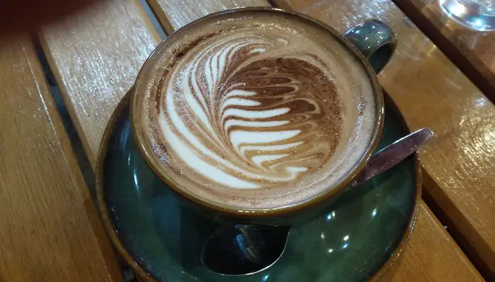 cup of latte with beautiful latte art