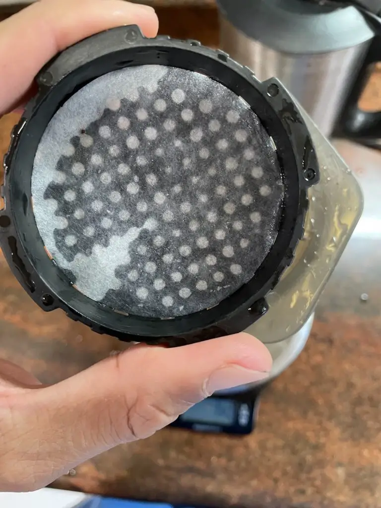 wet paper filter inside aeropress filter basket