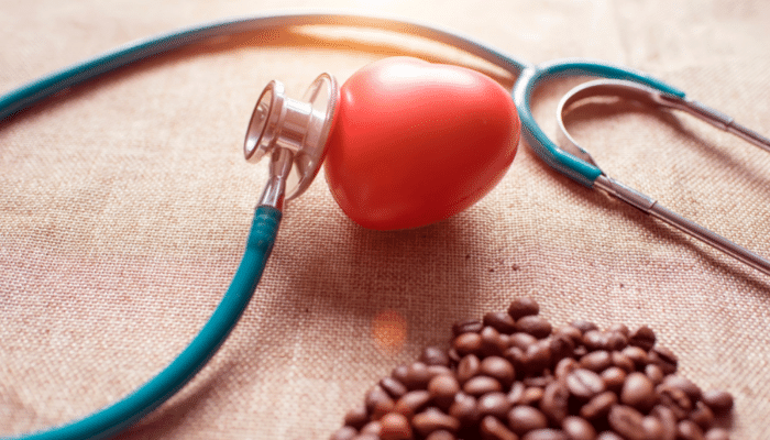 A red heart with coffee beans.
